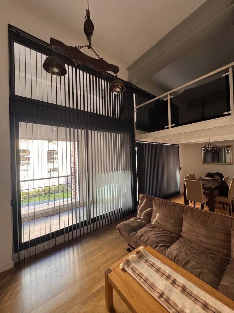 Estar de una vivienda proyectada por Bespoke Arquitectura